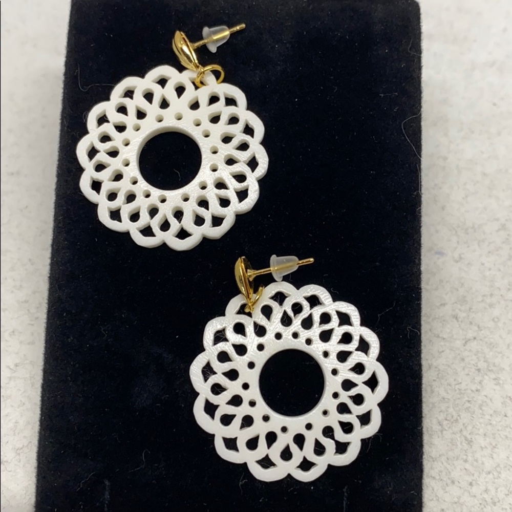 Handcrafted bone filigree disc pierced earrings